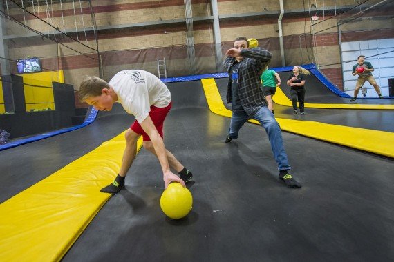 teenagers playing dodge ball